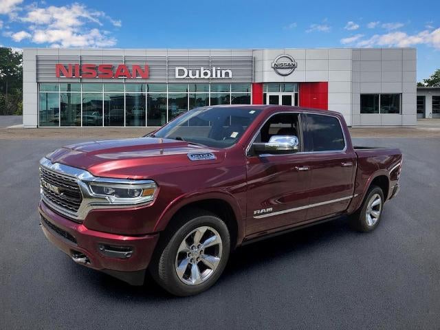 2019 RAM 1500 Limited 4x4 Crew Cab 5'7" Box in Delmonico Red Pearlcoat — front three-quarter view