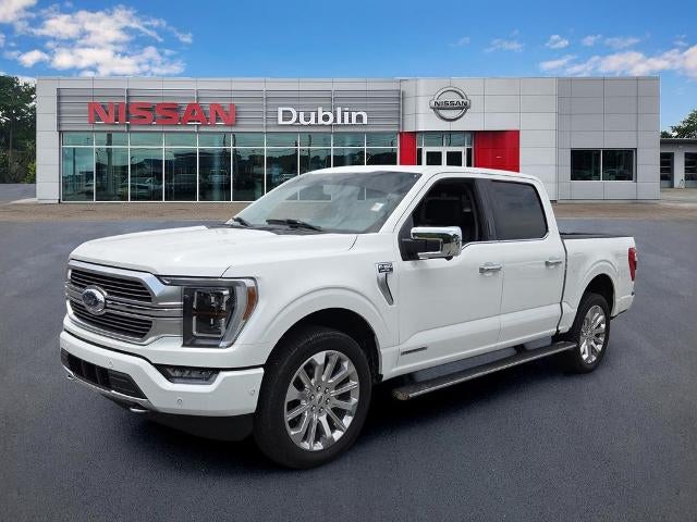 2023 Ford F-150 Limited 4WD SuperCrew 5.5' Box in Star White Metallic Tri-Coat — front three-quarter view