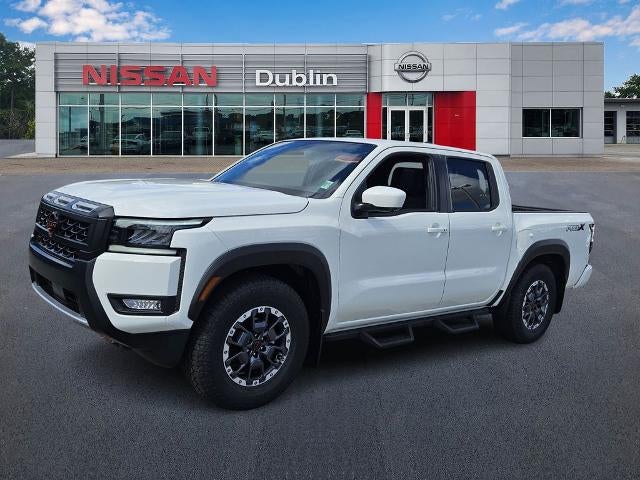 2026 Nissan Frontier Crew Cab PRO-X in Glacier White — front three-quarter view