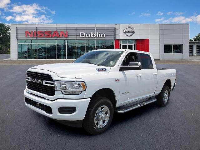 2021 RAM 2500 Big Horn 4x4 Crew Cab 6'4" Box in Bright White Clearcoat — front three-quarter view